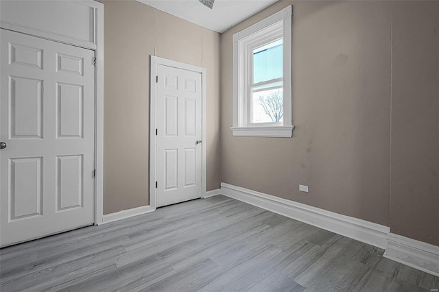 unfurnished bedroom featuring light hardwood / wood-style floors