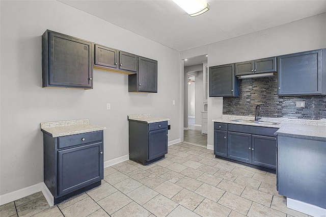 kitchen with decorative backsplash and sink