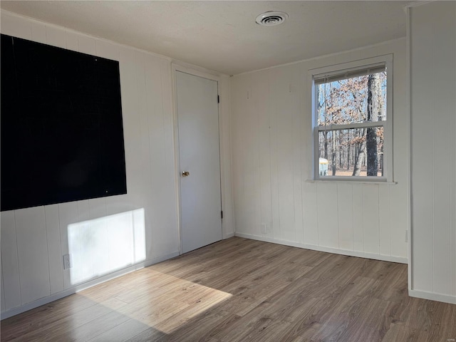 empty room featuring light hardwood / wood-style floors