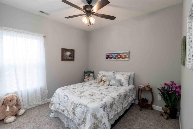 carpeted bedroom featuring ceiling fan