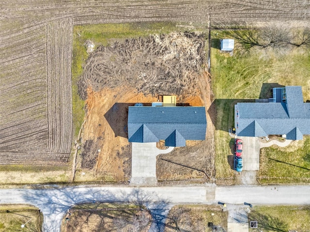 birds eye view of property featuring a rural view