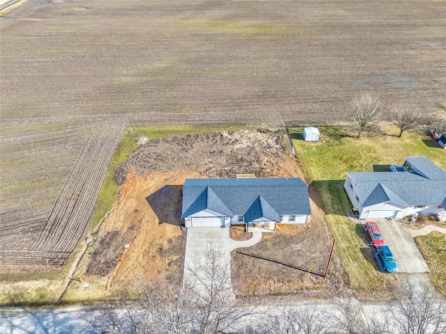 birds eye view of property featuring a rural view