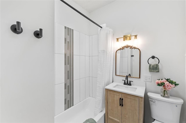 full bathroom featuring shower / bath combo with shower curtain, vanity, and toilet