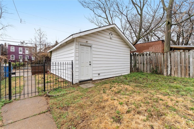 view of outbuilding featuring a yard