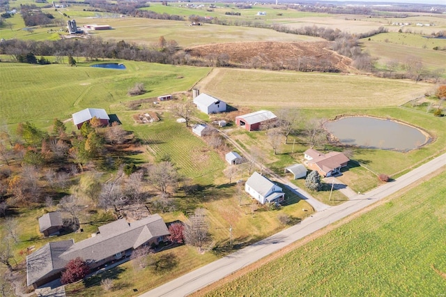 aerial view featuring a rural view and a water view