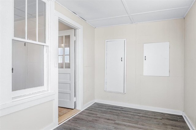 unfurnished room featuring dark hardwood / wood-style floors