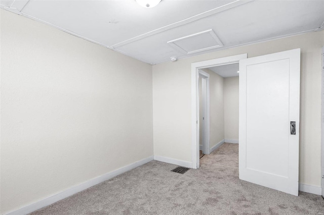 unfurnished bedroom featuring light colored carpet