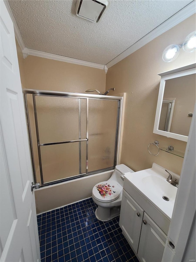 full bathroom with ornamental molding, vanity, a textured ceiling, tile patterned flooring, and toilet