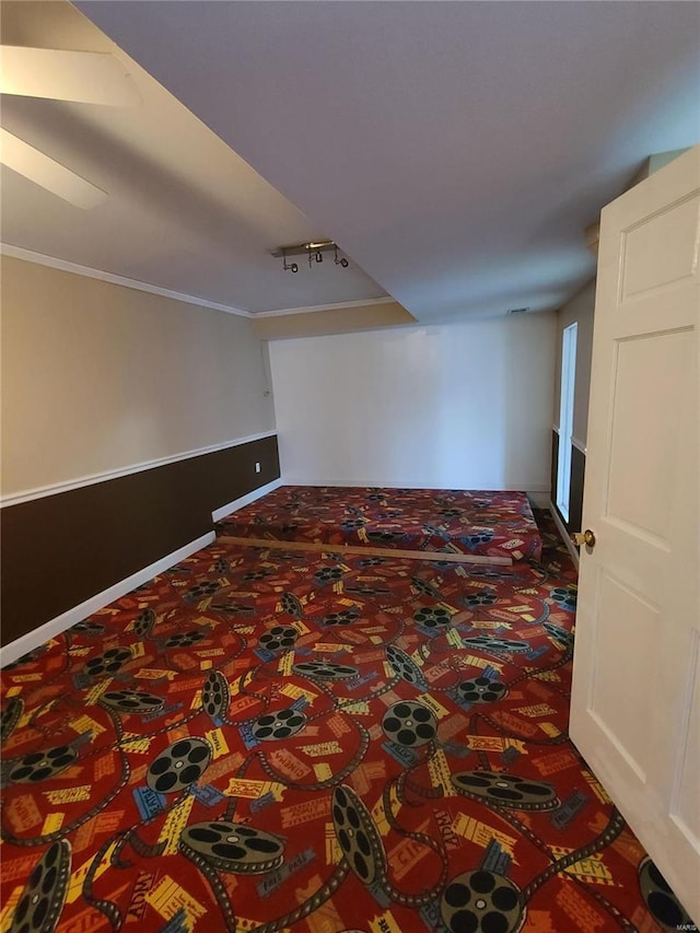 unfurnished room with crown molding