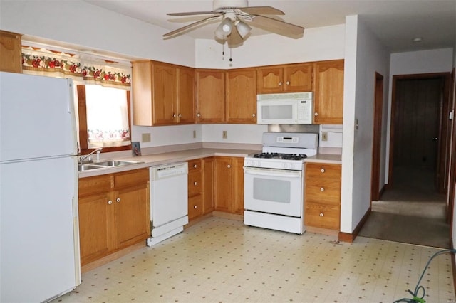 kitchen with ceiling fan, sink, and white appliances