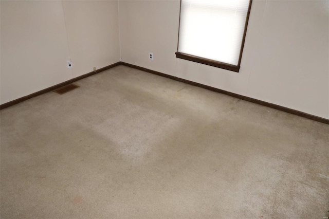 view of carpeted spare room