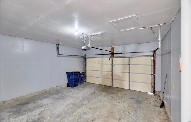 garage featuring a garage door opener