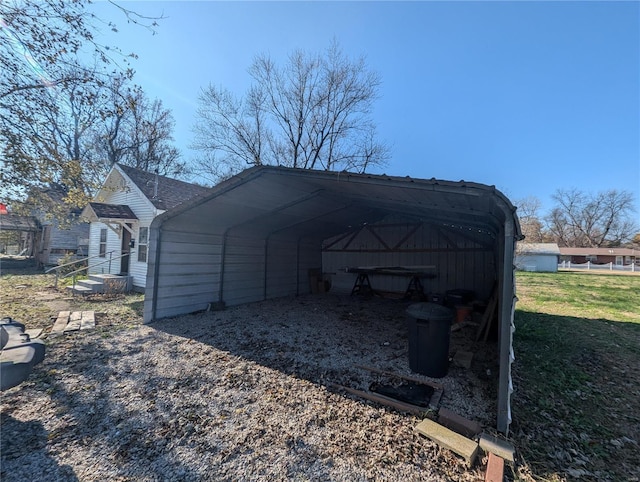 view of outdoor structure with a carport