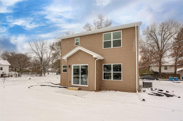 view of snow covered house