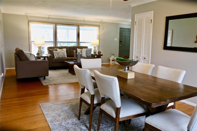 dining area featuring wood-type flooring