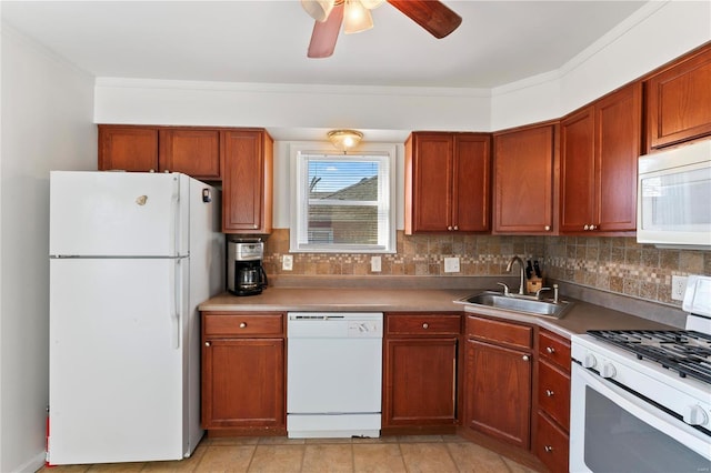 kitchen with white appliances, sink, ceiling fan, decorative backsplash, and ornamental molding