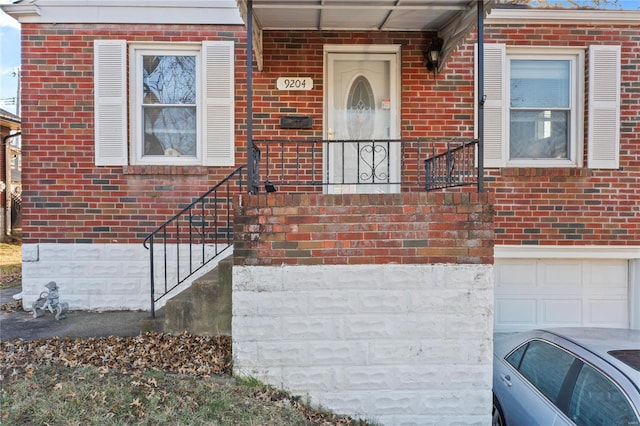 property entrance featuring a garage