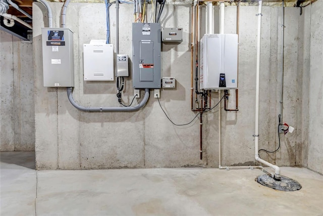 utility room featuring electric panel and tankless water heater