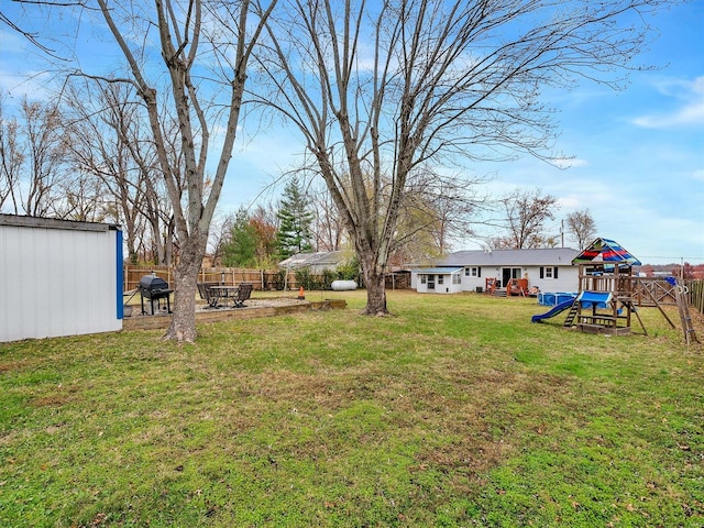 view of yard with a playground