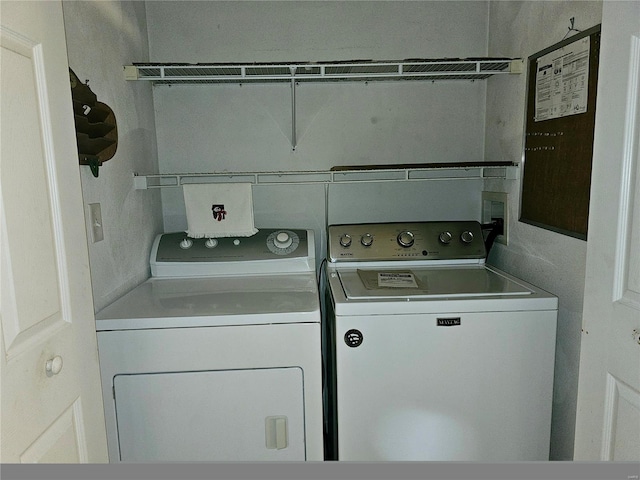 laundry room with washer and dryer