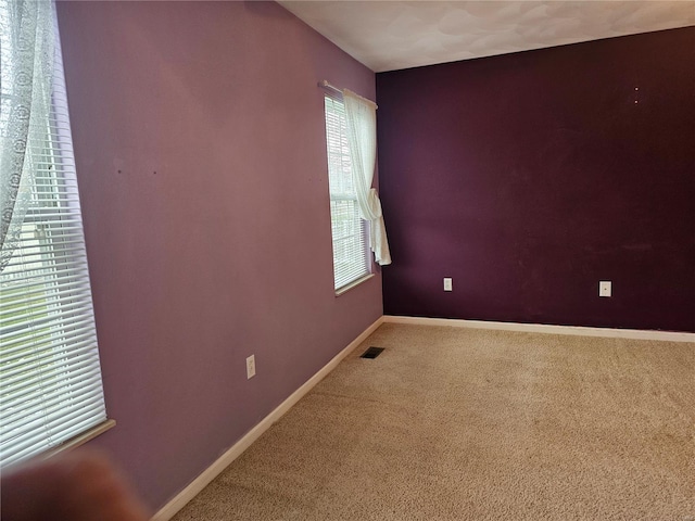 view of carpeted spare room