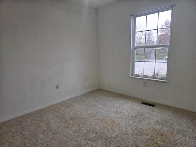 view of carpeted spare room