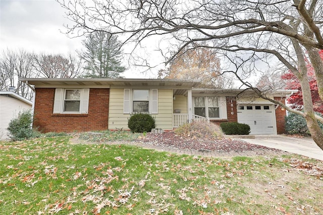 single story home with a front lawn and a garage