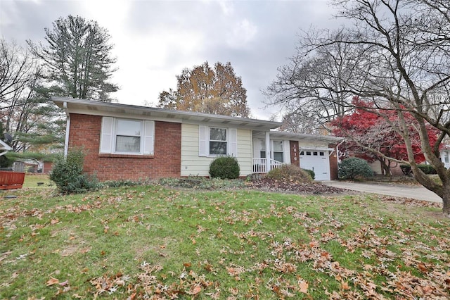 single story home featuring a front yard and a garage