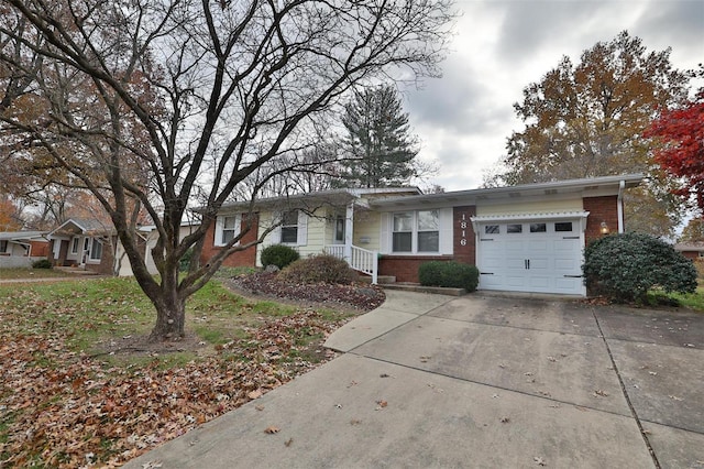 ranch-style home featuring a garage