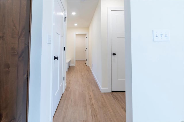 hall featuring light hardwood / wood-style flooring