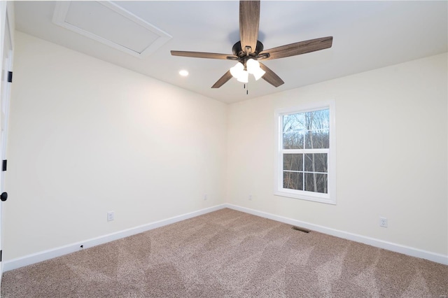 empty room with carpet and ceiling fan