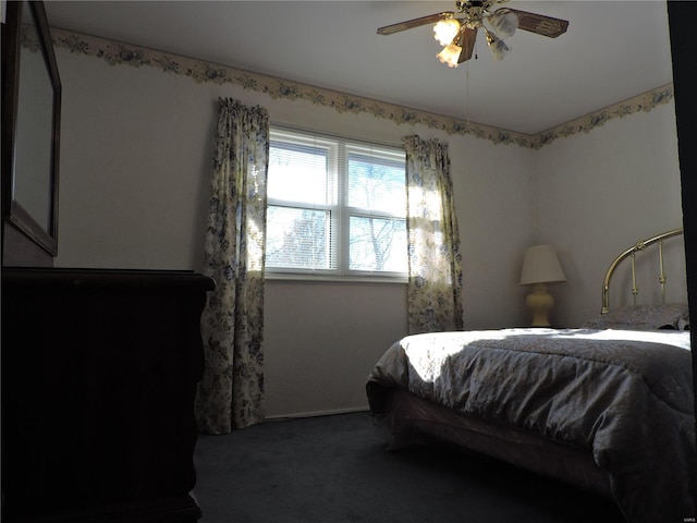 carpeted bedroom with ceiling fan