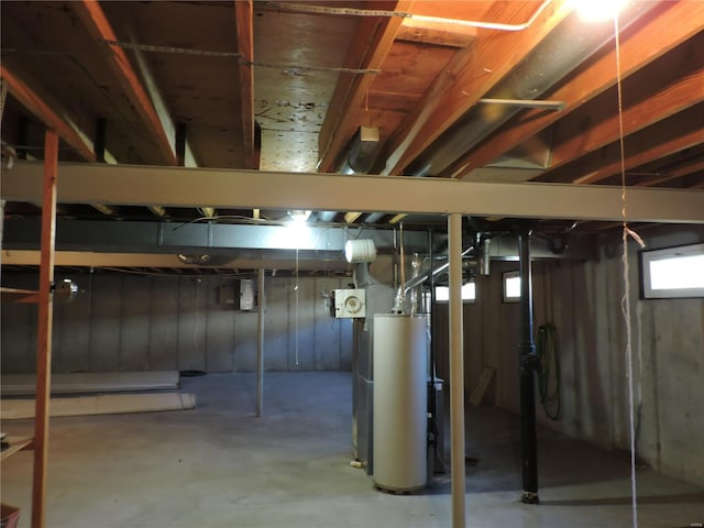 basement featuring water heater