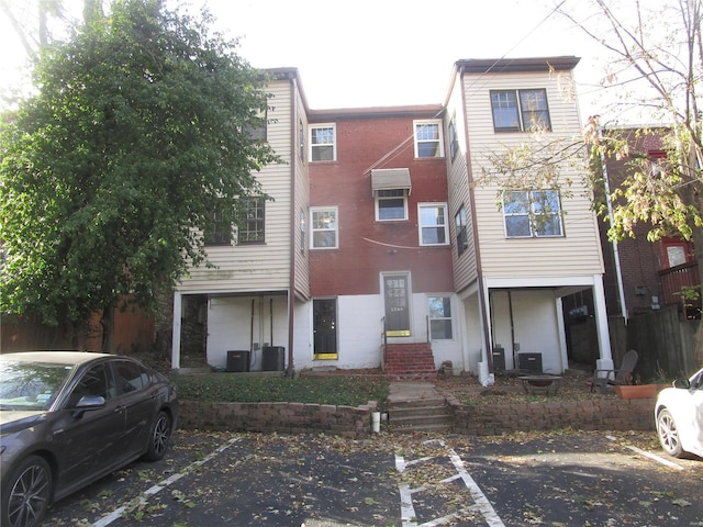 view of front of property featuring central AC unit