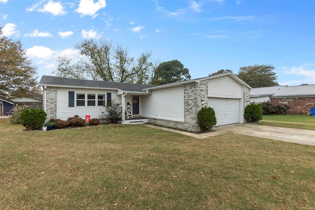 ranch-style home featuring a garage and a front yard