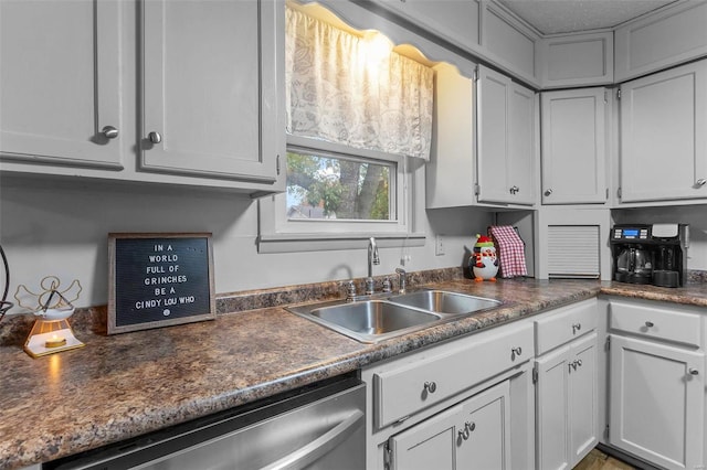 kitchen featuring dishwasher and sink