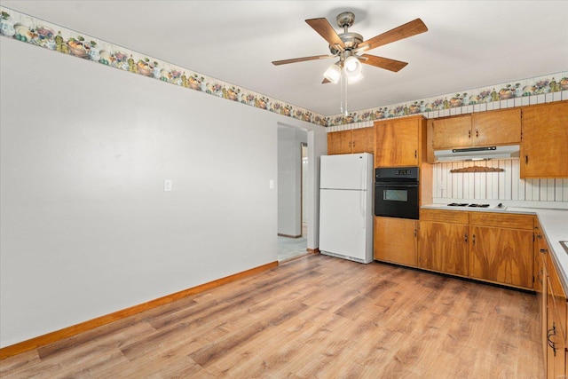 kitchen with ceiling fan, light wood-type flooring, and white appliances