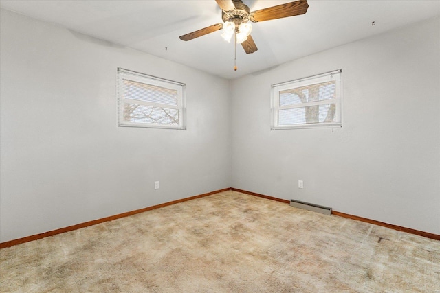 carpeted empty room with ceiling fan