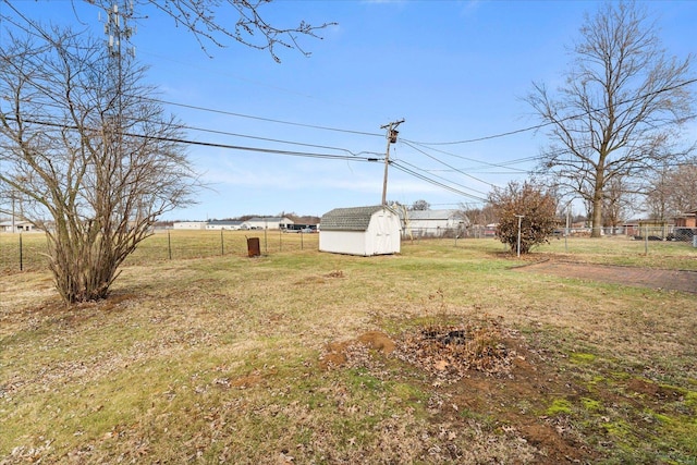 view of yard with a storage unit