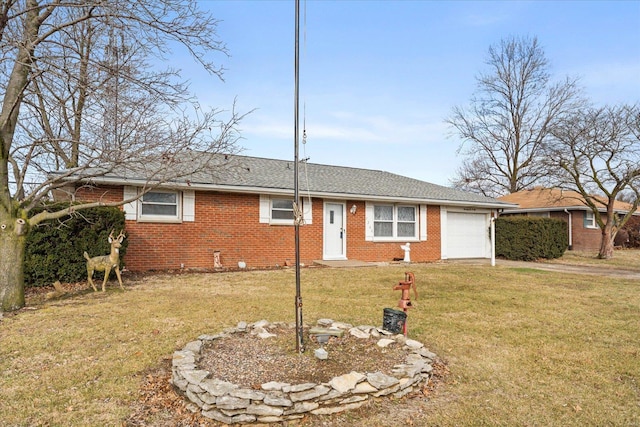 single story home with a garage and a front lawn