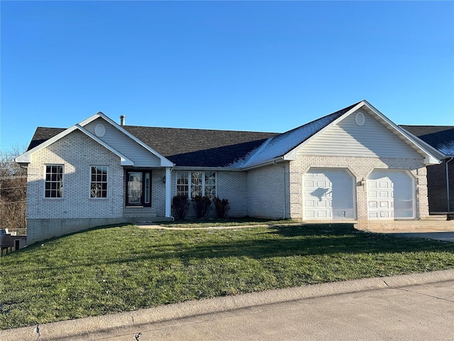 ranch-style house featuring a front yard, brick siding, driveway, and an attached garage