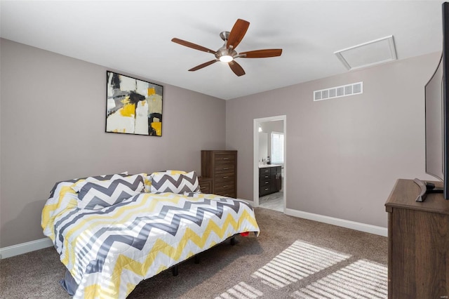 bedroom with carpet, ensuite bathroom, and ceiling fan