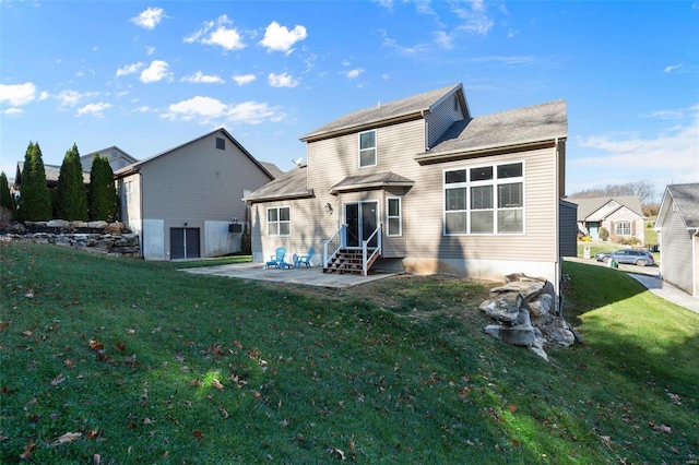 back of property featuring a yard and a patio area