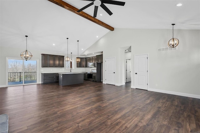 unfurnished living room with ceiling fan, beamed ceiling, dark hardwood / wood-style floors, and high vaulted ceiling