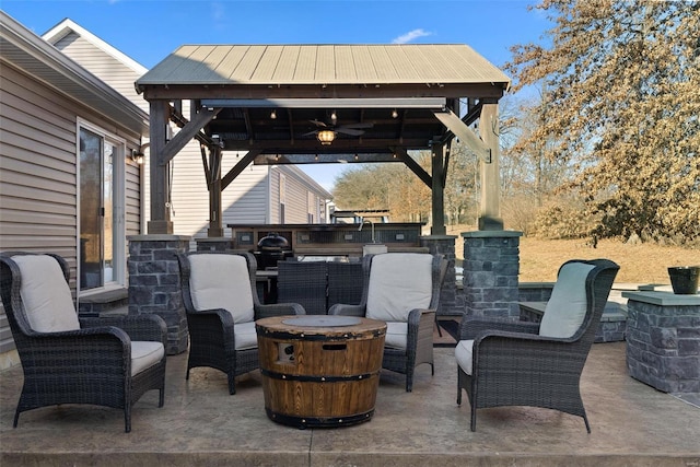 view of patio featuring a gazebo and a grill