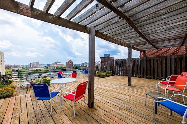 wooden terrace with a pergola