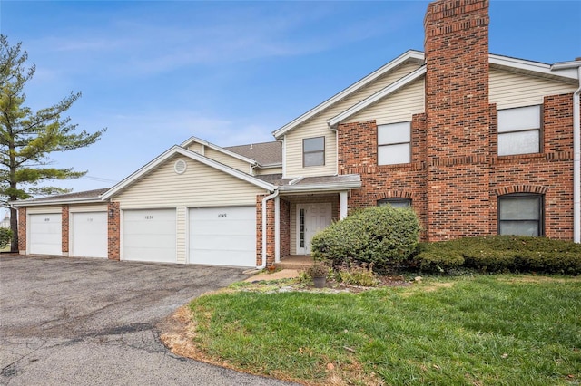 front of property with a garage