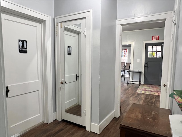 hallway with dark wood-type flooring