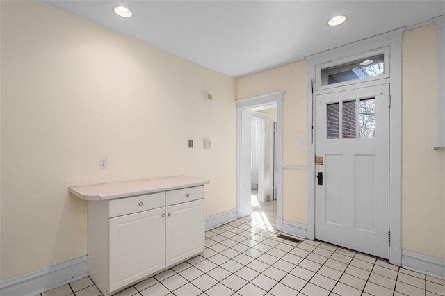 view of tiled foyer entrance