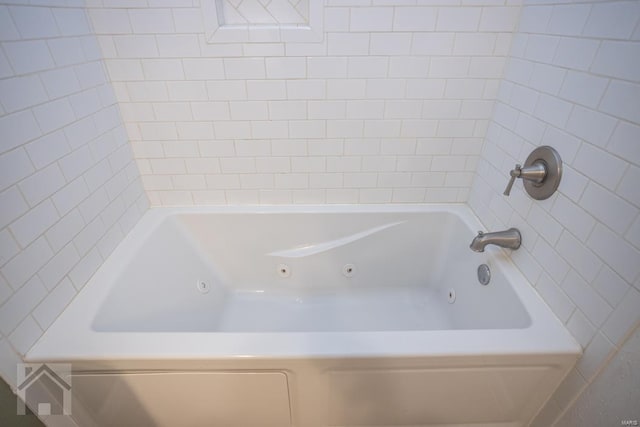 bathroom featuring a washtub